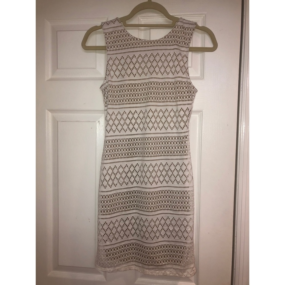 WHITE SLEEVELESS DRESS